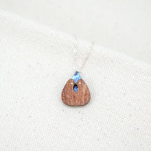 Load image into Gallery viewer, The Root of Things handmade necklace with blue hand painted titanium and wood
