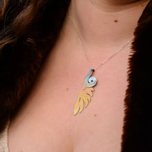 Load image into Gallery viewer, detail of model wearing the She Sheds Her Shell by the Seashore Necklace
