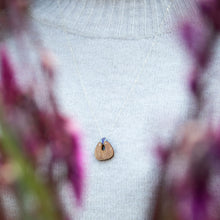 Load image into Gallery viewer, woman&#39;s neckline wearing The Root of Things necklace over a light grey sweater
